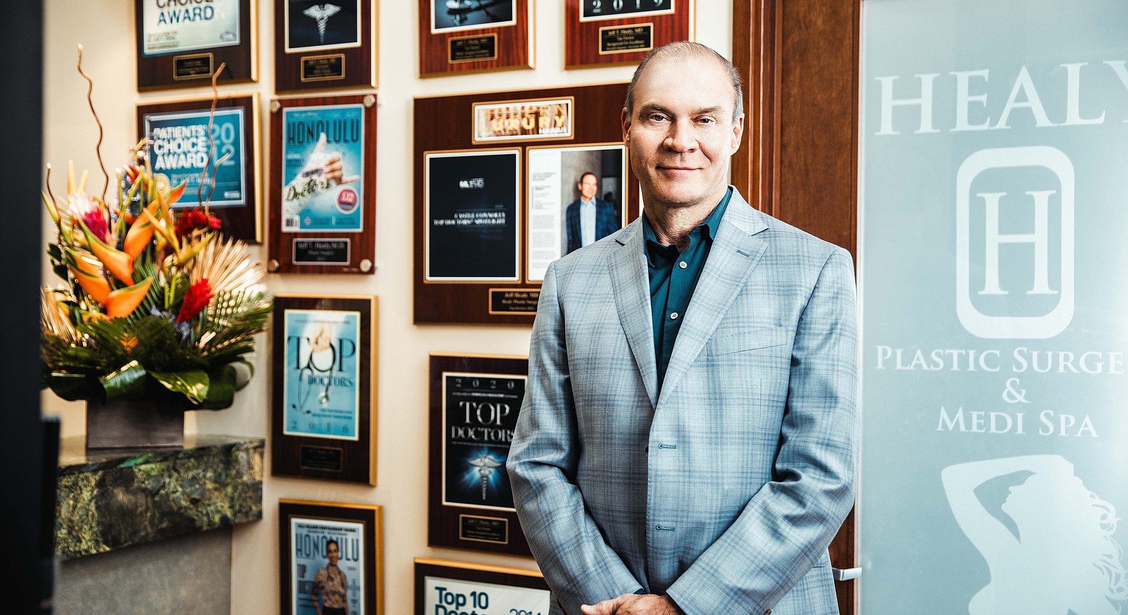 Doctor consulting with patient in office setting.
